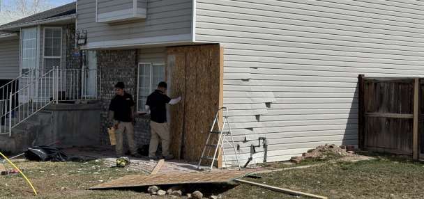 Car crashes into West Valley home, misses family members