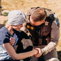 12-year-old fighting cancer gets puppy, plenty of police support at lemonade stand