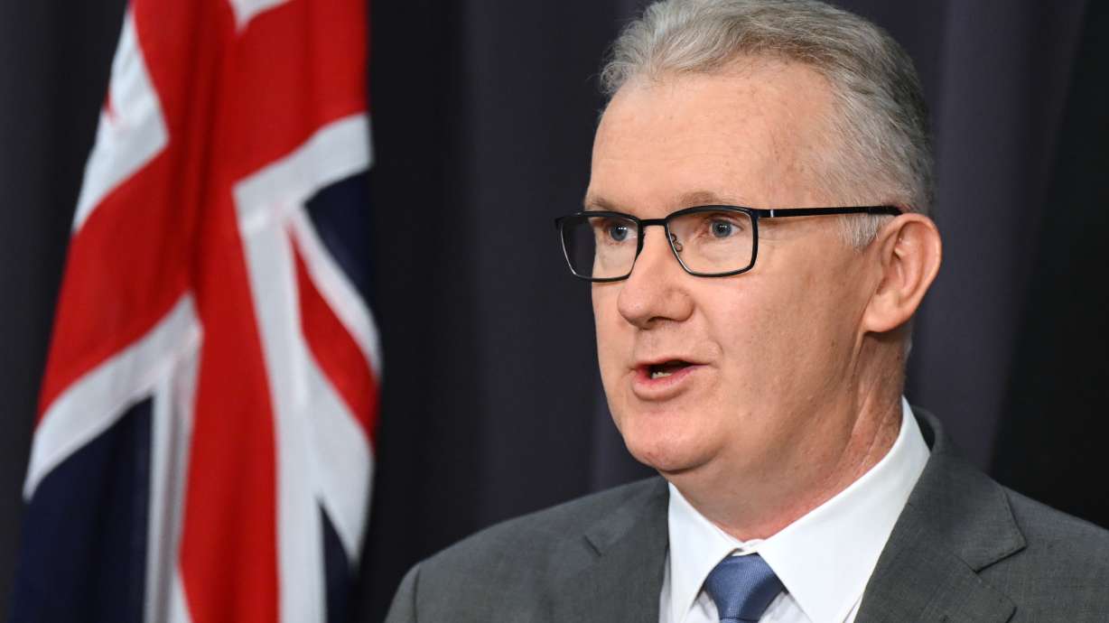 Australian Home Affairs Minister Tony Burke speaks to the media during a press conference at Parliament House in Canberra, Australia, Wednesday, March 11, 2026. /AAP Image via AP)