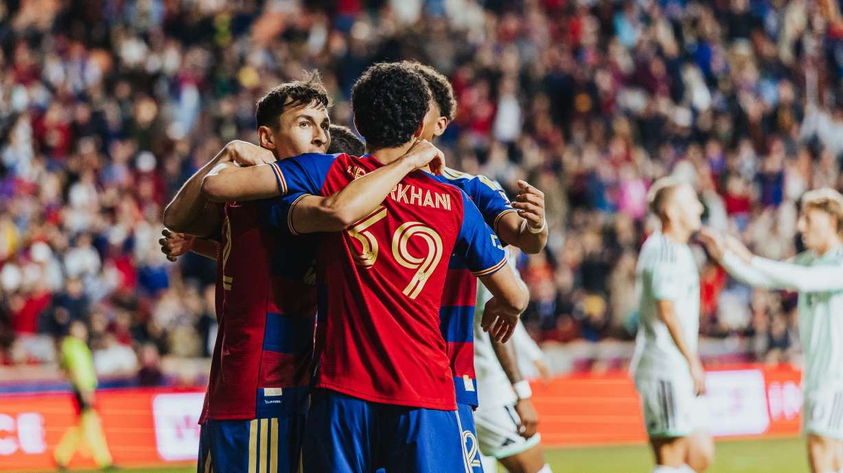 Real Salt Lake's Aiden Hezarkhani celebrates an own goal with teammate Noel Caliskan during an MLS soccer match against Austin FC, Saturday, March 14, 2026 at America First Field in Sandy, Utah.