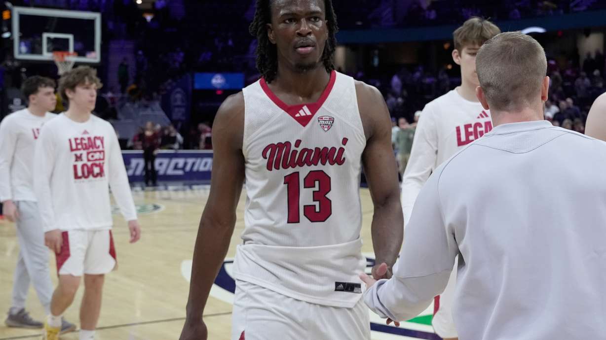 Miami (Ohio) forward Antwone Woolfolk (13) was off the court after Miami (Ohio) was defeated by Massachusetts in a basketball game in the quarterfinals of the Mid-American Conference tournament, Thursday, March 12, 2026, in Cleveland.