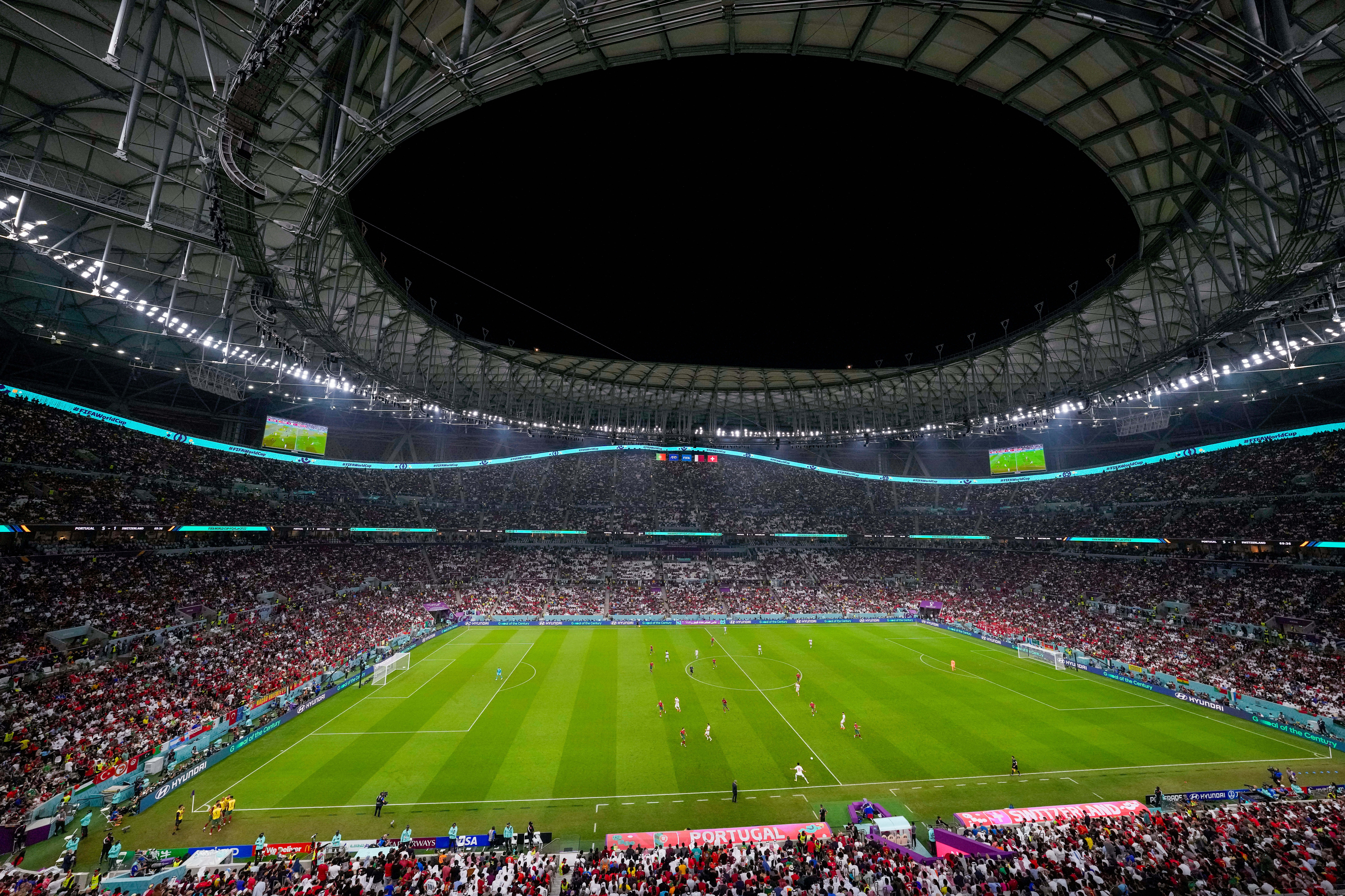FILE - Spectators fill the stands during the World Cup round of 16 soccer match between Portugal and Switzerland, at the Lusail Stadium in Lusail, Qatar, Dec. 6, 2022.