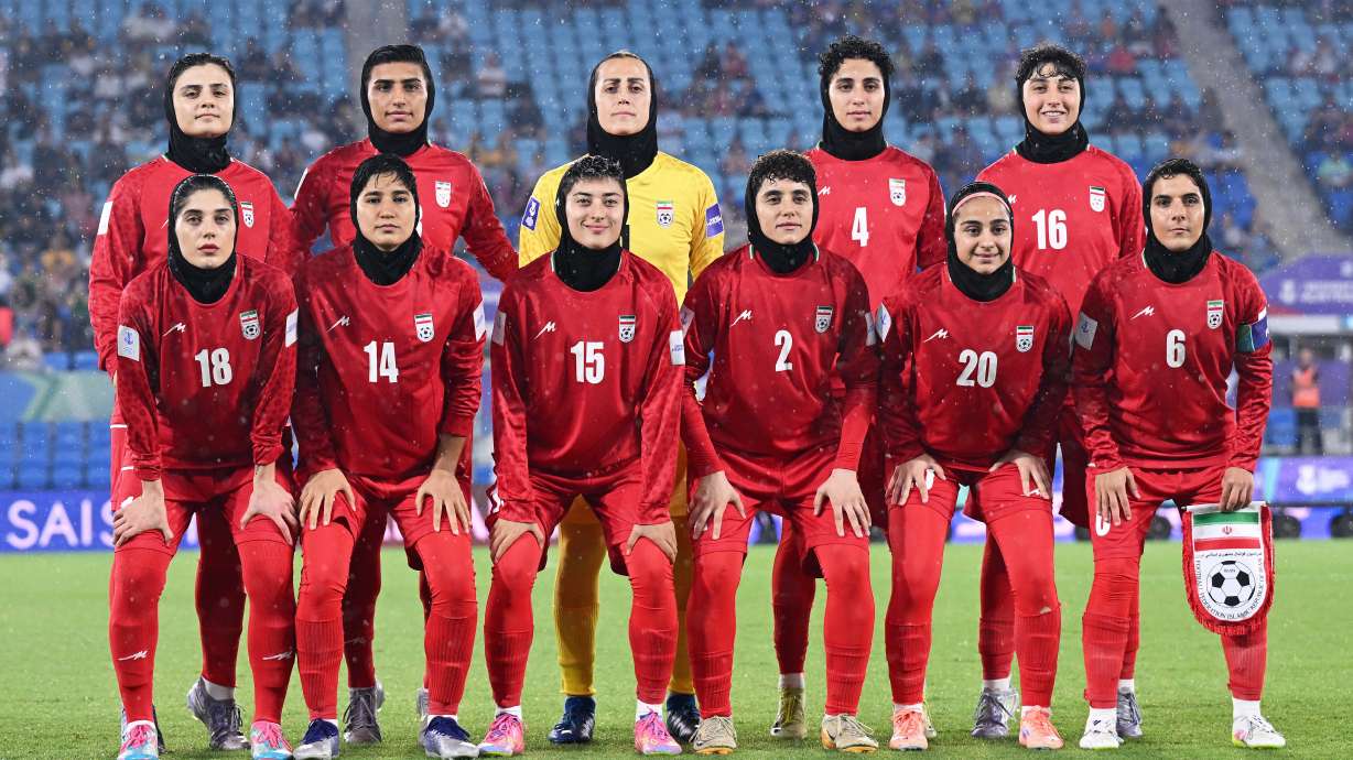 FILE - Iran players pose for a team photo ahead of the Women's Asian Cup soccer match between Iran and the Philippines in Robina, Australia, Sunday, March 8, 2026.