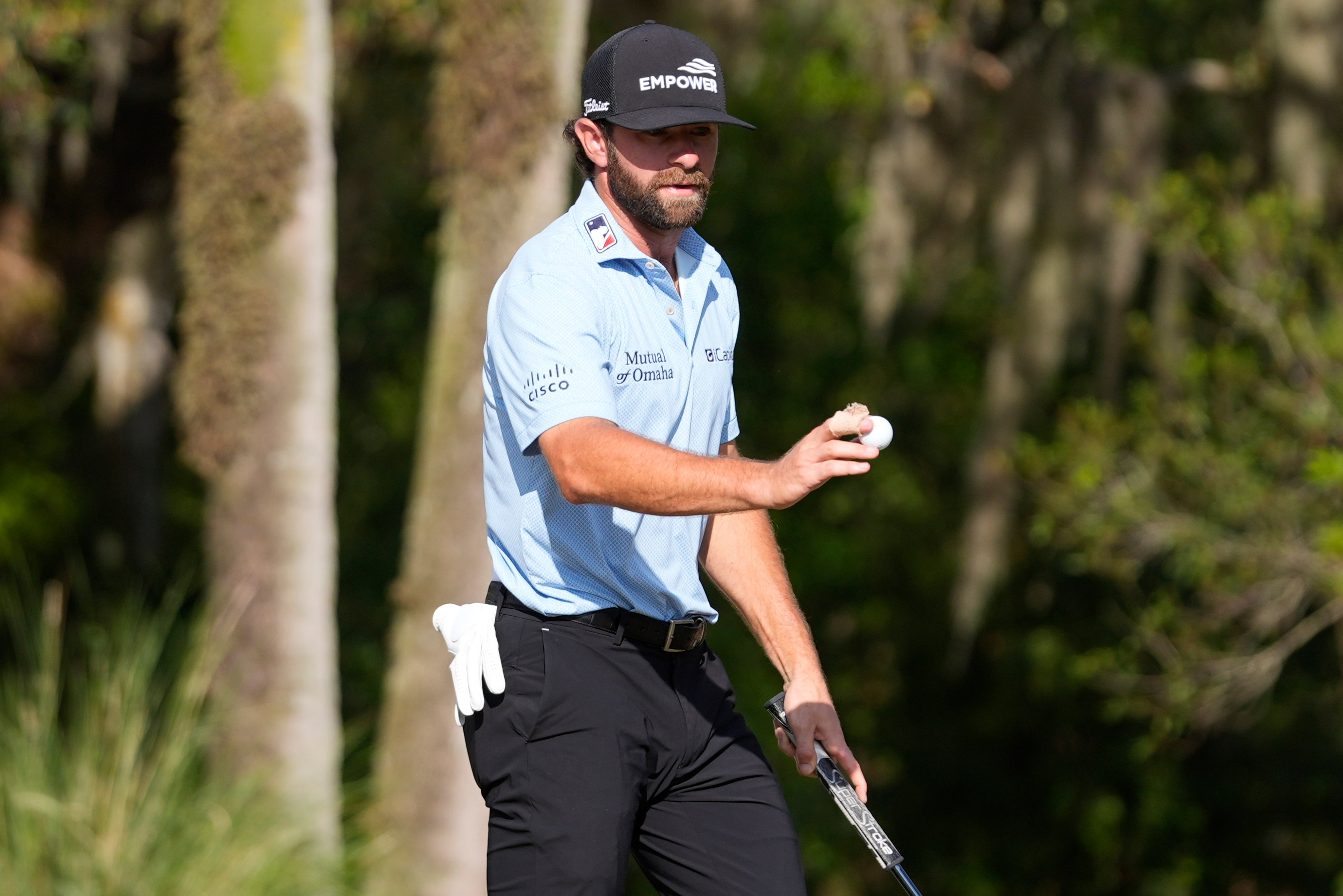 Cameron Young is clutch on the island green and rallies to win The Players Championship