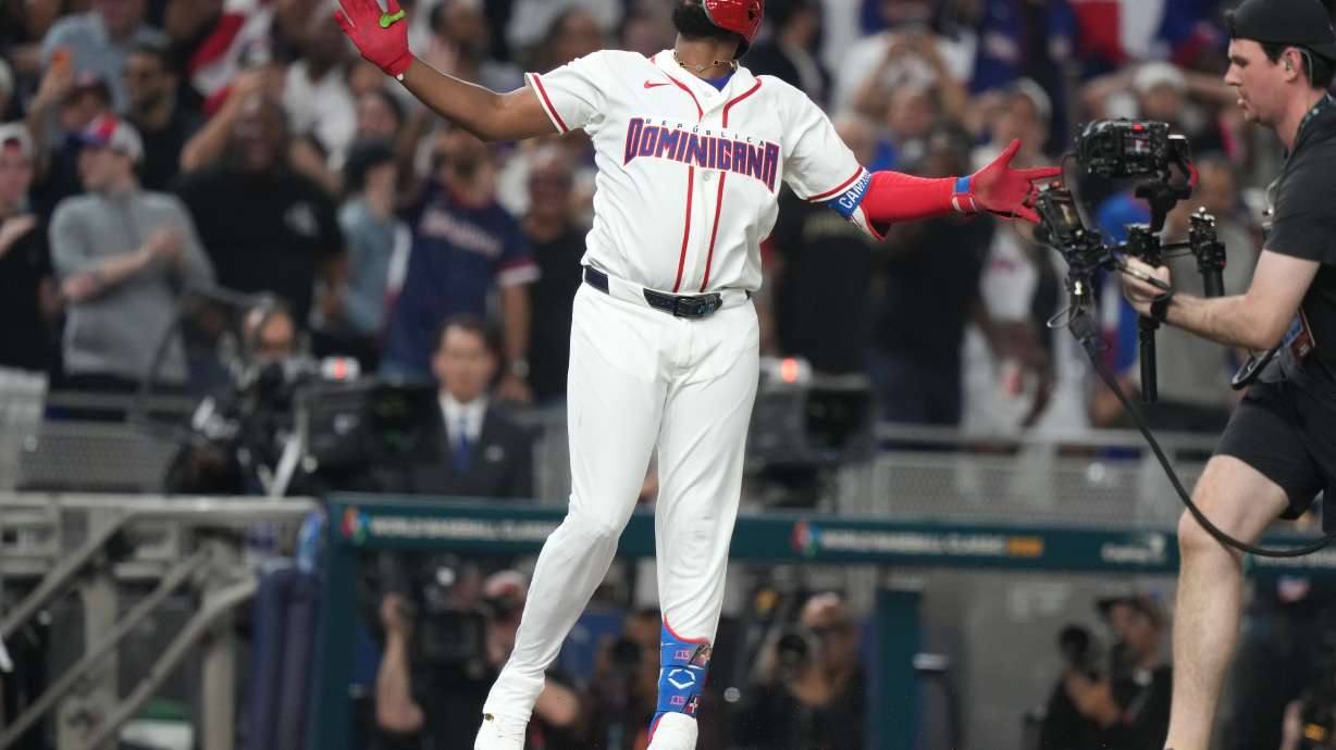 Dominican Republic's Junior Caminero looks up after hitting a home run during the second inning of a World Baseball Classic semifinal game against the United States, Sunday, March 15, 2026, in Miami.