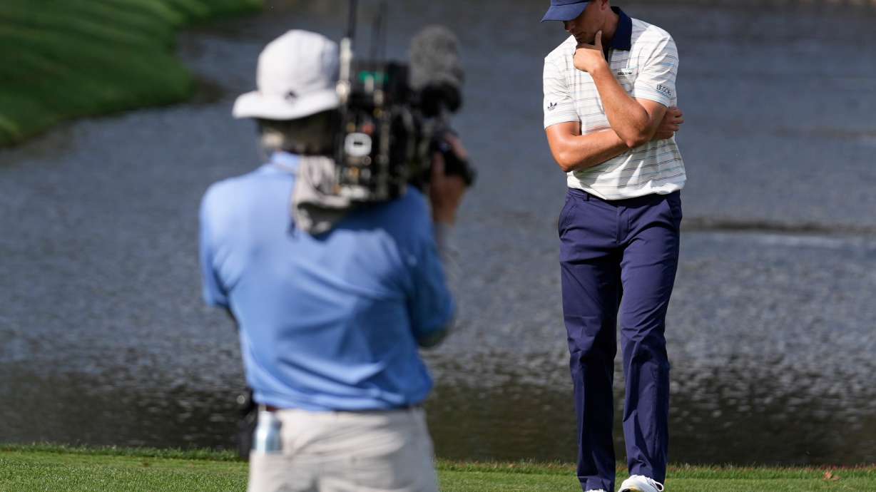 Ludvig Aberg of Sweden, reacts to his ball hitting the water on the 12th hole during the final round of The Players Championship golf tournament, Sunday, March 15, 2026, in Ponte Vedra Beach, Fla.
