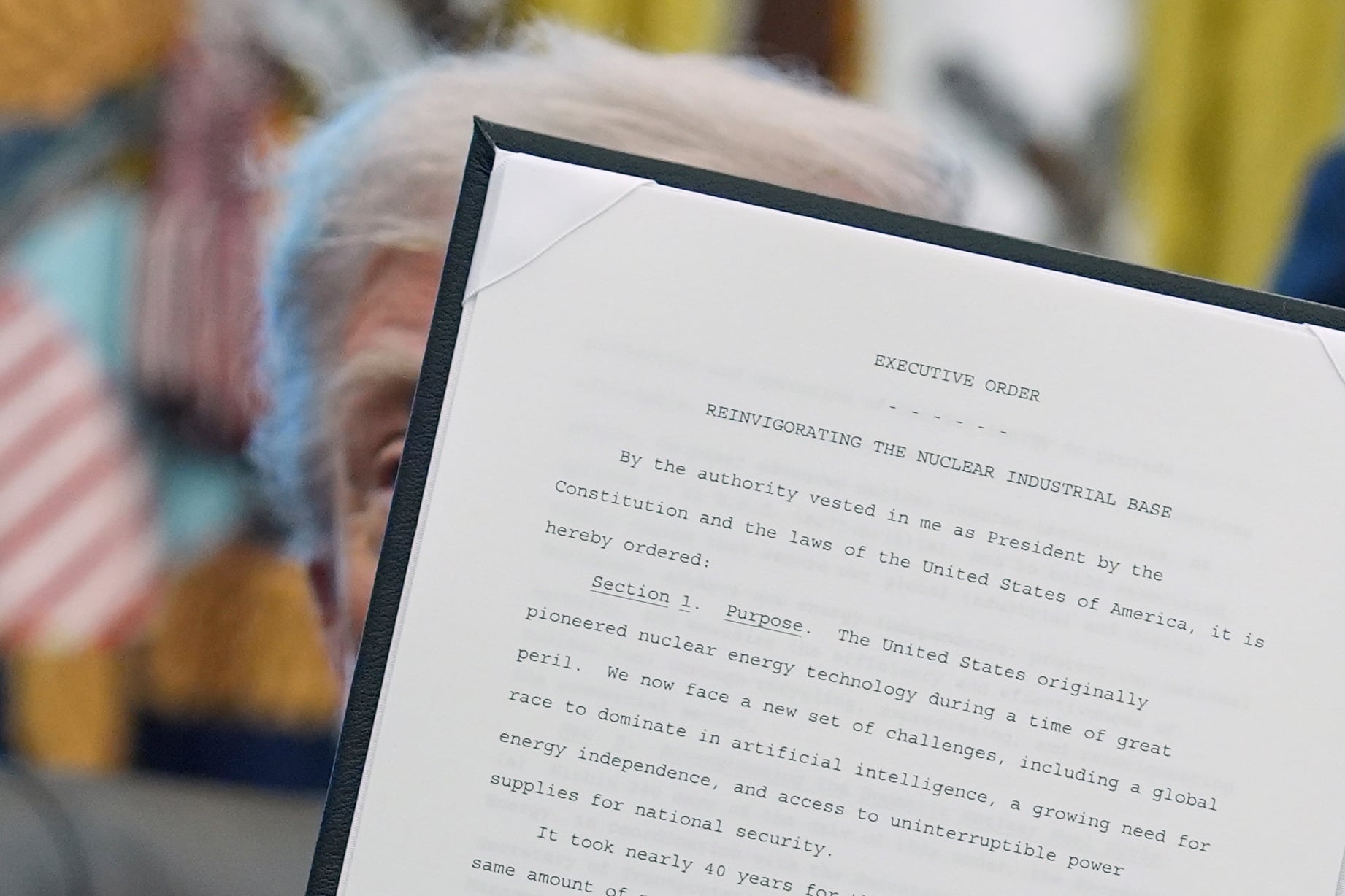President Donald Trump holds an executive order regarding reinvigorating the nuclear industrial base, in the Oval Office of the White House, May 23, 2025, in Washington.