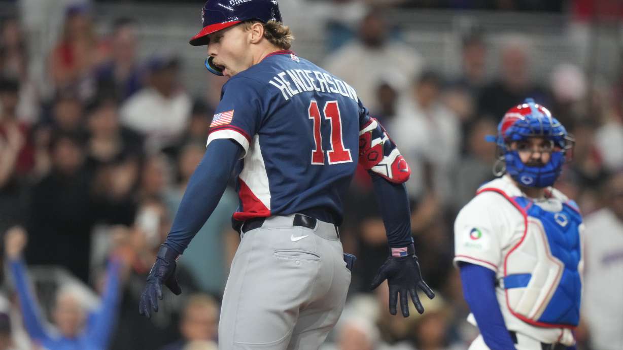 United States' Gunnar Henderson (11) celebrates after hitting a home run during the fourth inning of a World Baseball Classic semifinal game against the Dominican Republic, Sunday, March 15, 2026, in Miami.