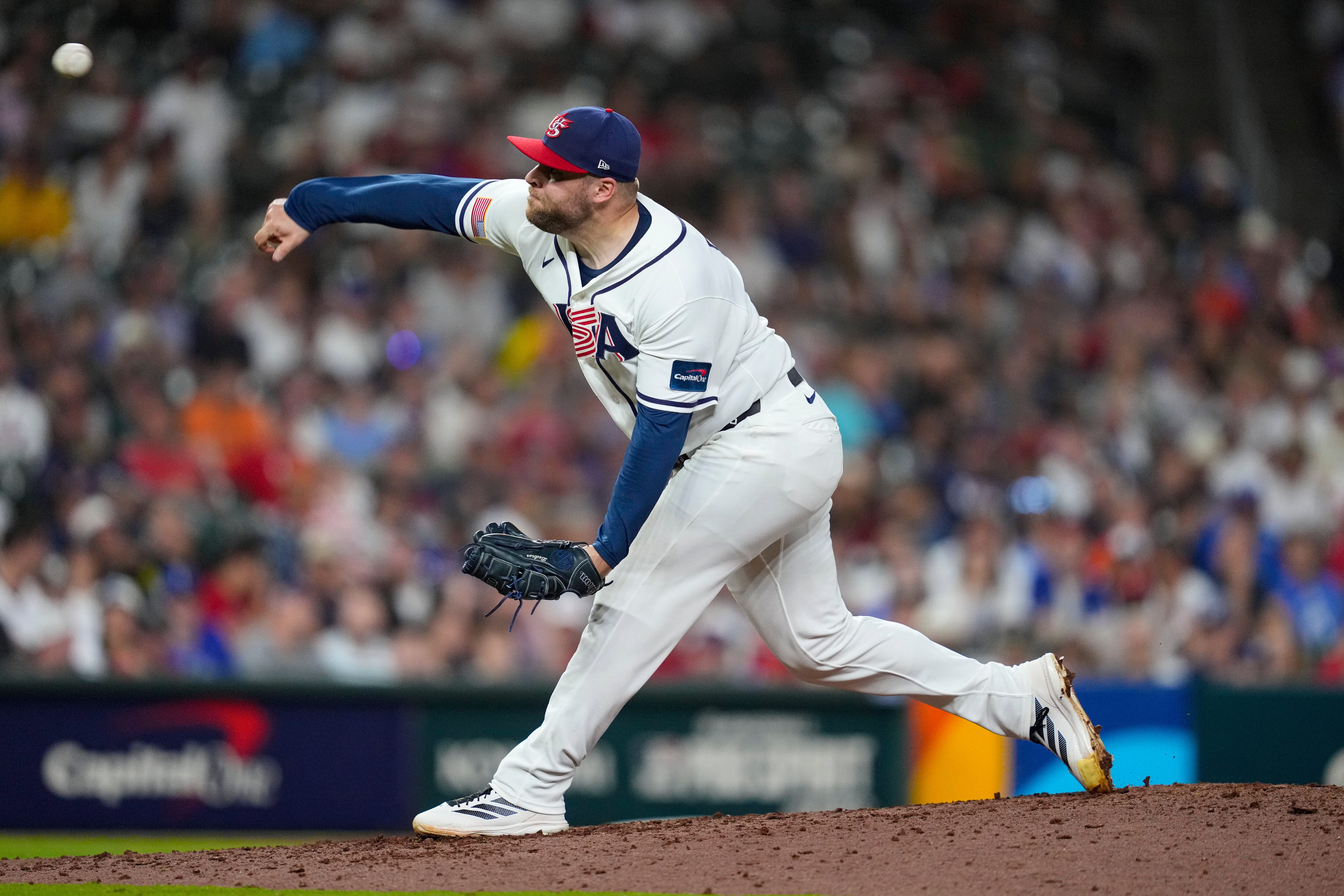 United States pitcher David Bednar throws in the eighth inning of the World Baseball Classic against Italy on March 10 in Houston. Bednar shares the same name as Elder David A. Bednar of the Quorum of the Twelve Apostles.