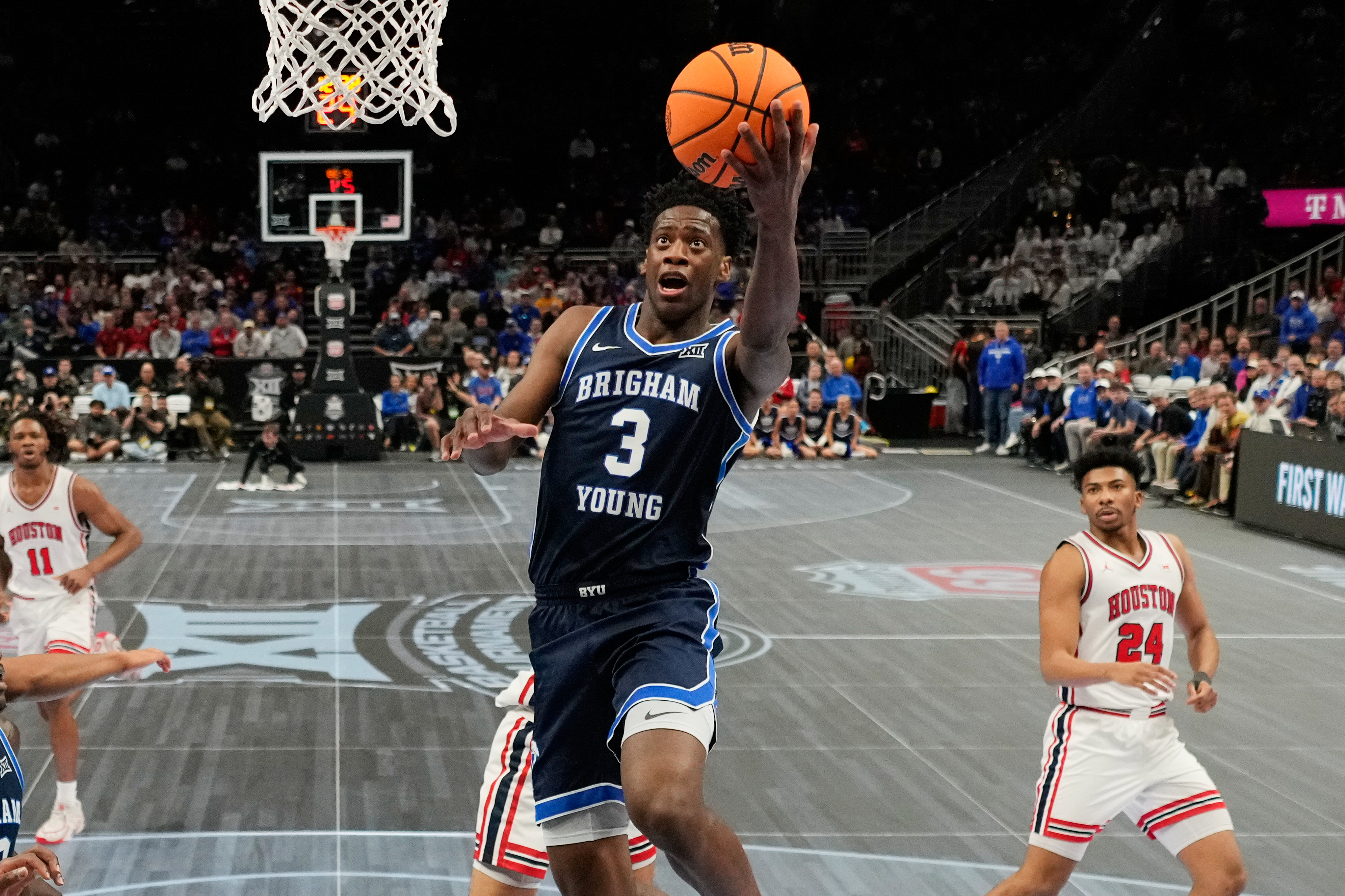 BYU forward AJ Dybantsa (3) shoots during the first half of an NCAA college basketball game against Houston in the quarterfinal round of the Big 12 Conference tournament Thursday, March 12, 2026, in Kansas City, Mo.