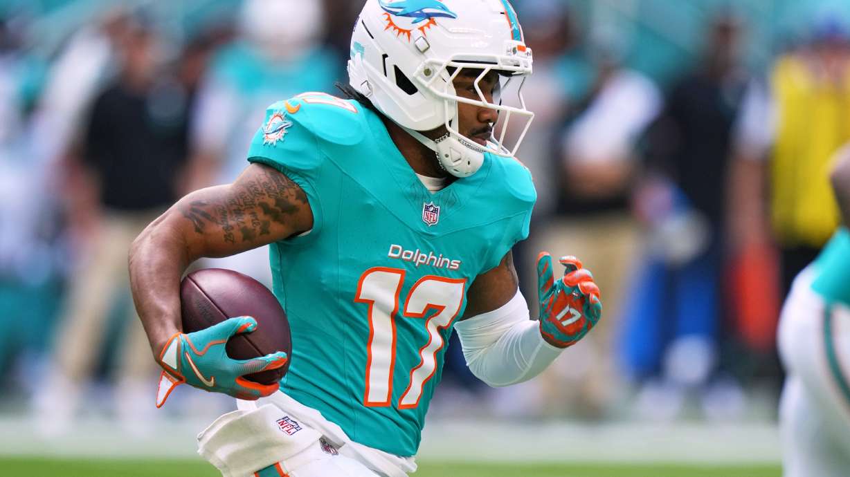 FILE - Miami Dolphins wide receiver Jaylen Waddle (17) runs during the first half of an NFL football game against the Tampa Bay Buccaneers, Dec. 28, 2025, in Miami Gardens, Fla.
