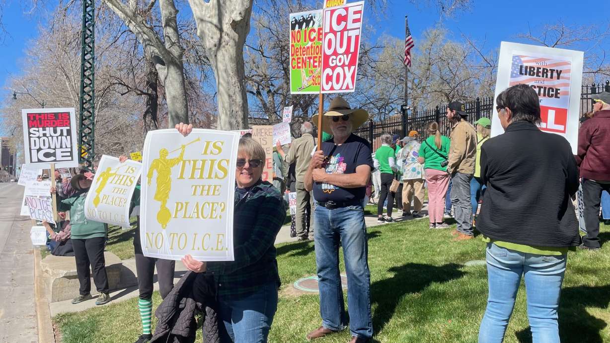 About 100 demonstrators gathered outside the mansion of Gov. Spencer Cox in Salt Lake City on Tuesday to protest plans to build an immigrant detention facility in the city.