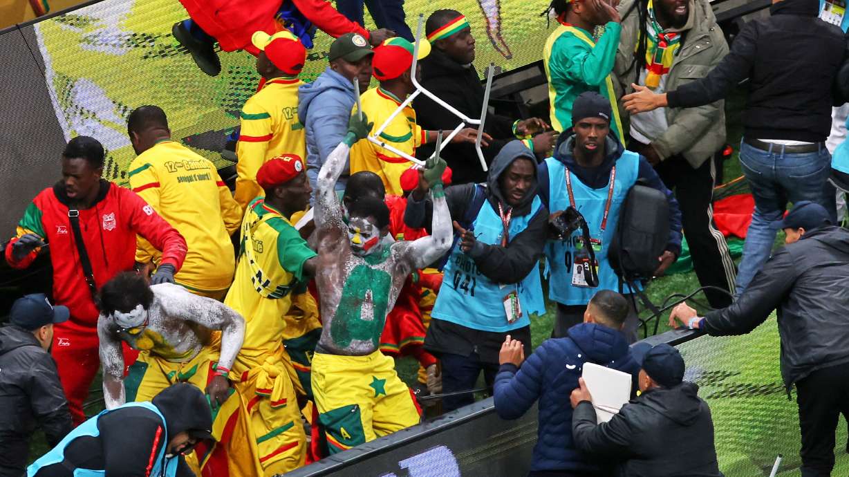 FILE - Senegal supporters protest after a controversial penalty was awarded to Morocco during the Africa Cup of Nations final soccer match between Senegal and Morocco on Jan. 18, 2026, in Rabat, Morocco.