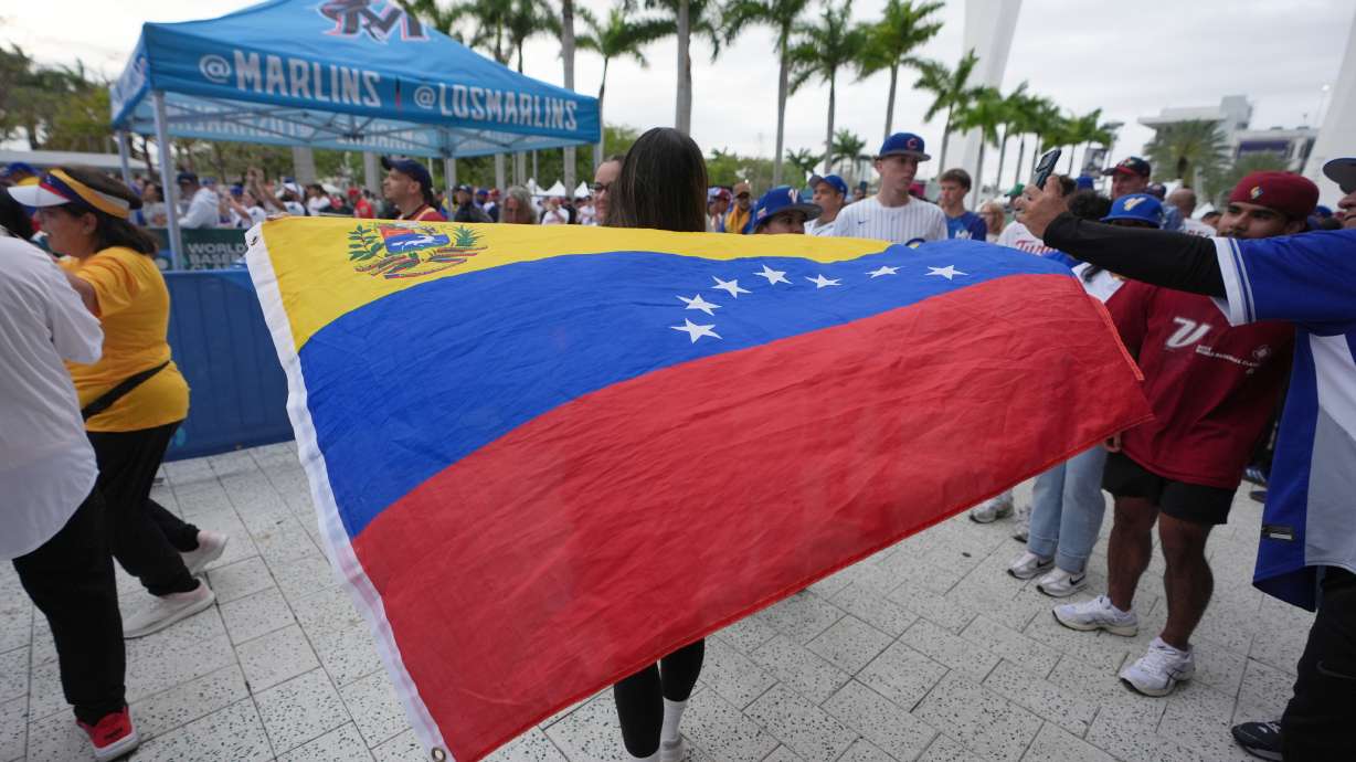 Venezuela fans gather before the championship game of the World Baseball Classic against the United States, Tuesday, March 17, 2026, in Miami.