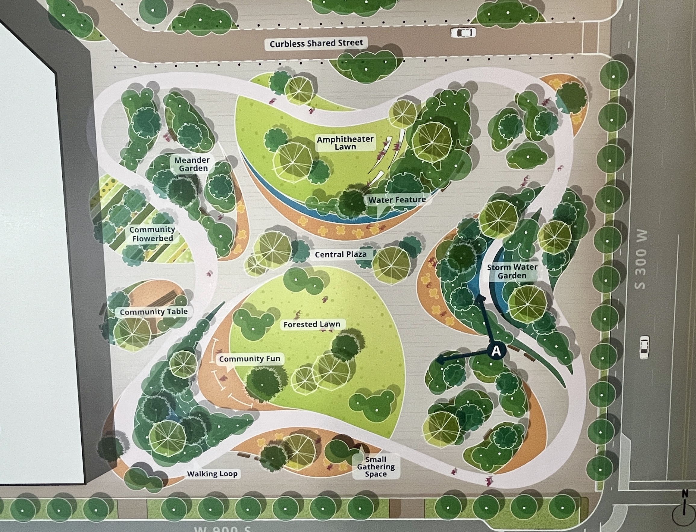 A preliminary rendering of a proposed 2.4-acre open space at the Fleet Block is displayed at a community open house in Salt Lake City on Tuesday. A final design of the open space will be released later this year.