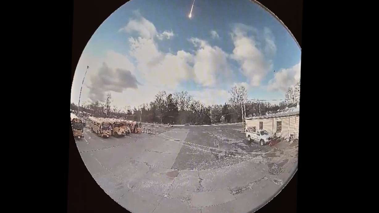 This image made from video shows video taken from a surveillance camera showing a suspected meteor falling through the sky in Olmsted Falls, Ohio, on Tuesday.