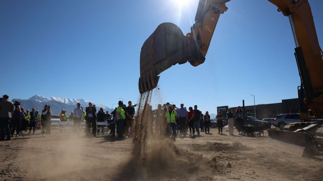 Utah Department of Transportation officials along with city, county and state leaders break ground for the 2100 North freeway project in Lehi on Wednesday.