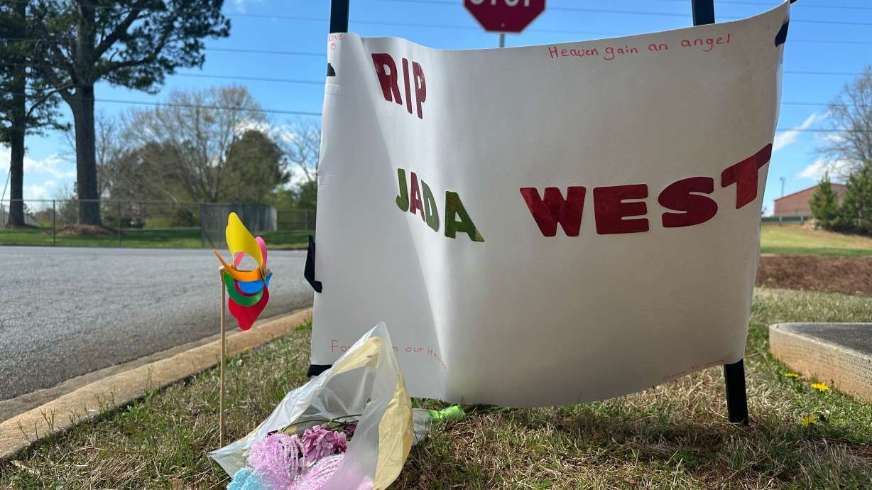A paper sign left in memory of Jada West stands in her neighborhood in Villa Rica, Ga., Wednesday, March 11, 2026.