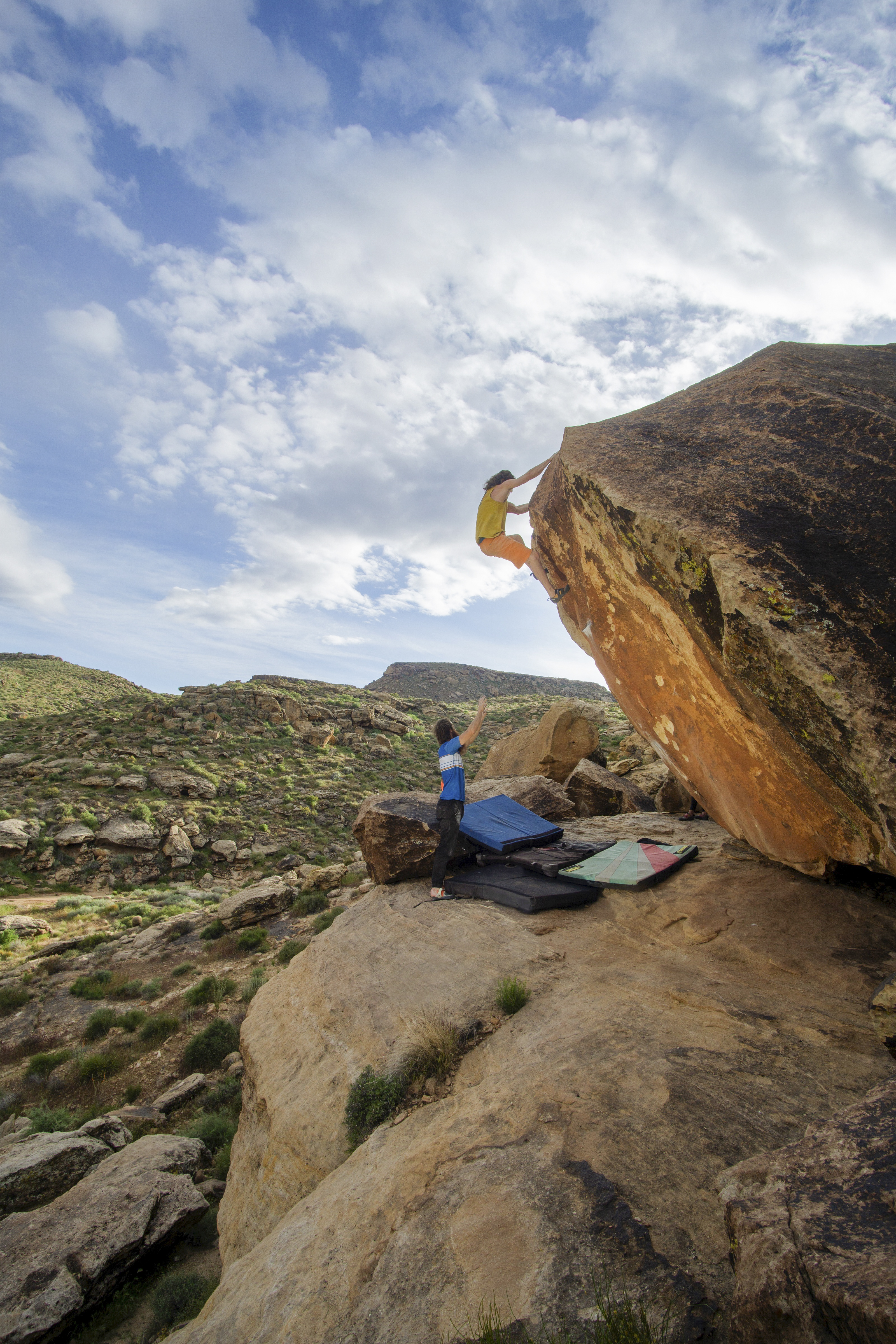 Isaac Caldiero climbs boulder in Moe's Valley in St. George. Groups in southern Utah has formed the Open Space and Recreation Preservation Committee to help protect open spaces in the area.