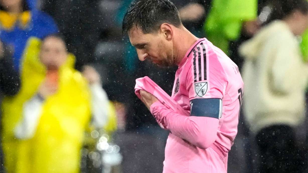 Inter Miami forward Lionel Messi leaves the field in the rain after a draw against Nashville SC in a CONCACAF Champions Cup Round of 16 soccer match, Wednesday, March 11, 2026, in Nashville, Tenn.