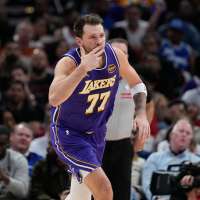 Doncic drops 40, James adds 30 as Lakers stretch their streak to 7 with 124-116 win over Rockets