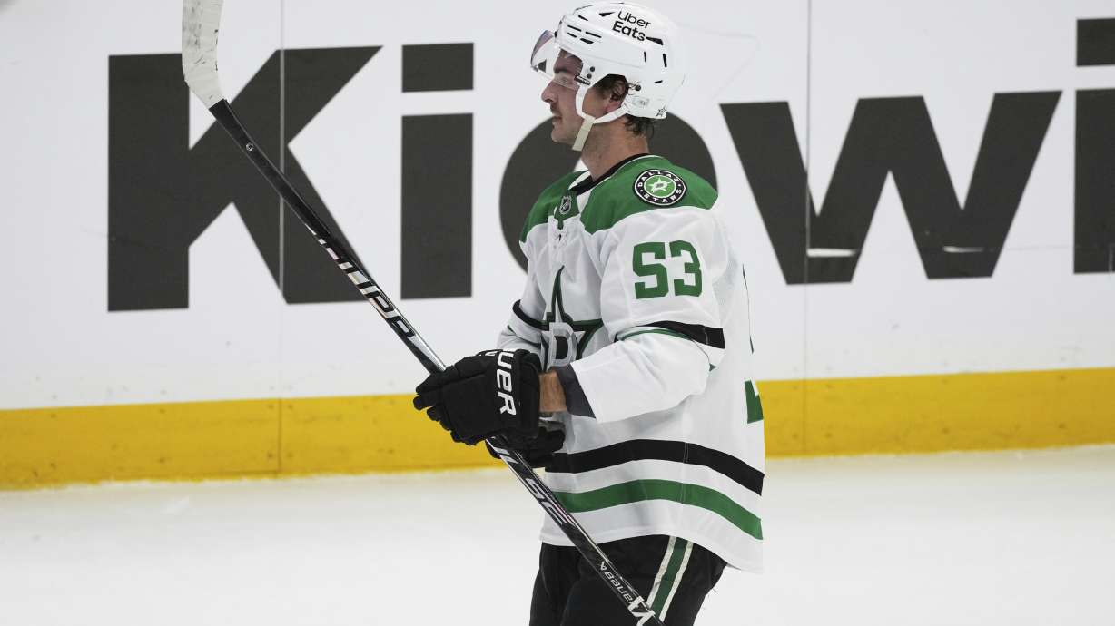 Dallas Stars center Wyatt Johnston reacts after scoring the winning goal during a shootout in an NHL hockey game against the Colorado Avalanche, Wednesday, March 18, 2026, in Denver.