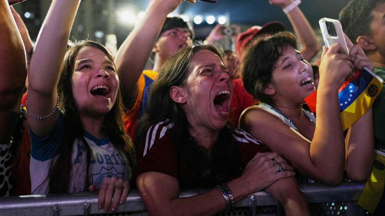 Venezuela fans celebrate their country's win against the United States in the championship match of the World Baseball Classic a day prior, in Caracas, Venezuela, Wednesday, March 18, 2026.