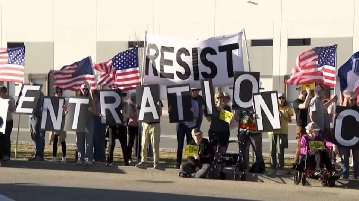 About 500 people protest at the site of a proposed ICE detention facility in Salt Lake City on Wednesday.