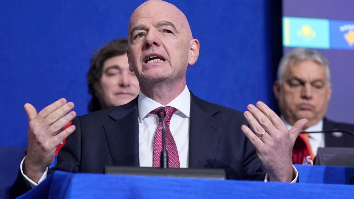 FIFA President Gianni Infantino speaks during a Board of Peace meeting at the U.S. Institute of Peace, Thursday, Feb. 19, 2026, in Washington.