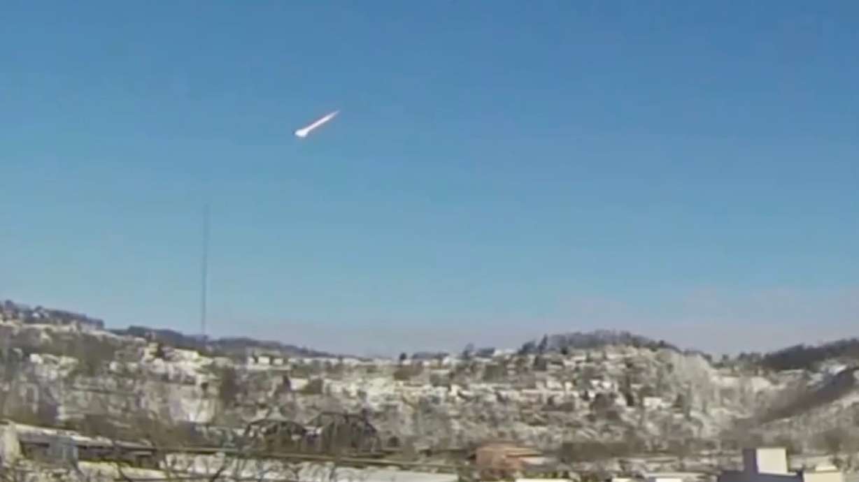 This image taken from video shows a suspected meteor falling through the sky in the greater Pittsburgh, Pa., area on Tuesday. Meteorite hunters fanned out across Ohio on Thursday to find fragments of the space rock that crashed into Earth.