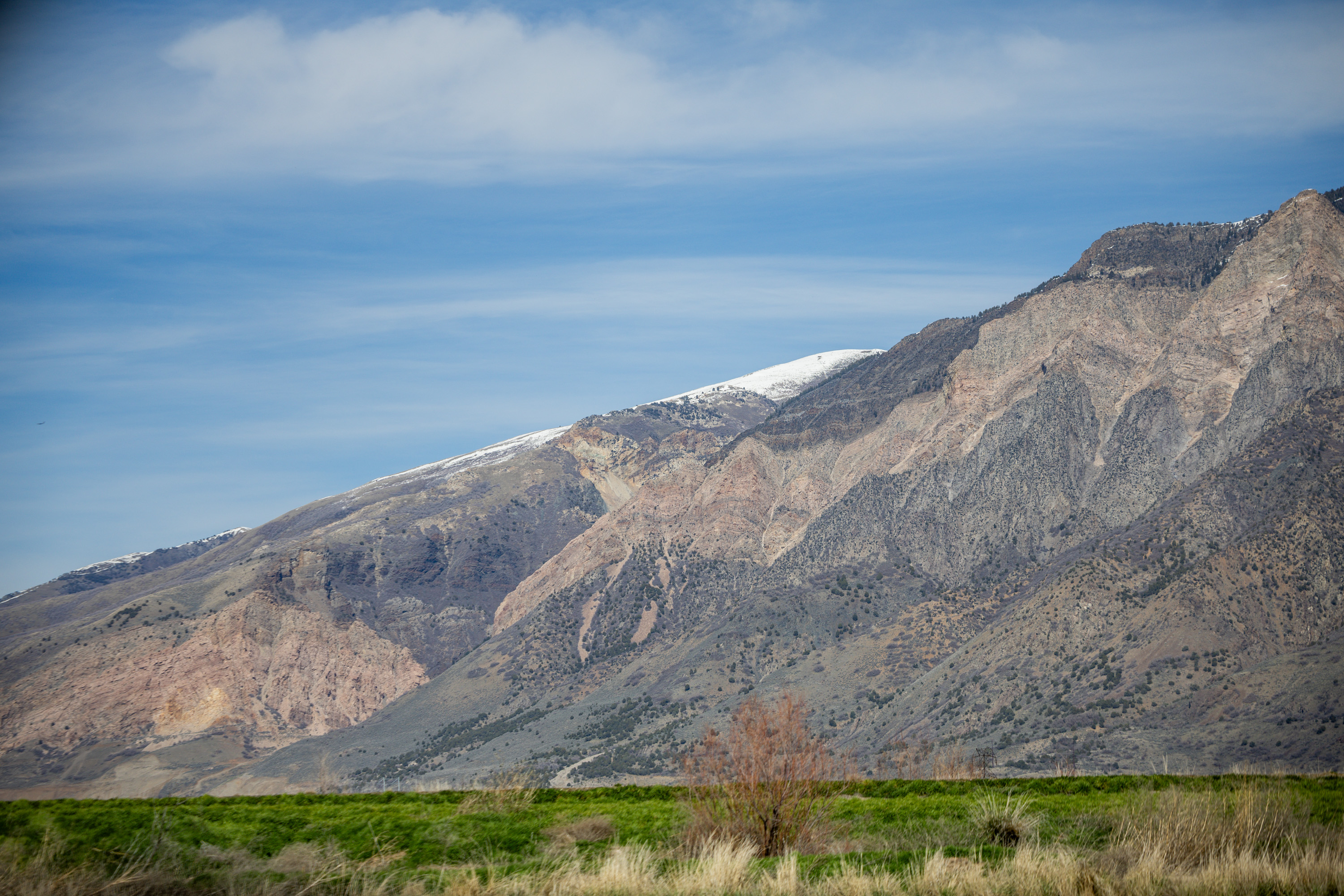 A view of the Wasatch Mountains from Willard Bay State Park in Willard on Tuesday. A low snowpack is raising concerns across the Intermountain West.