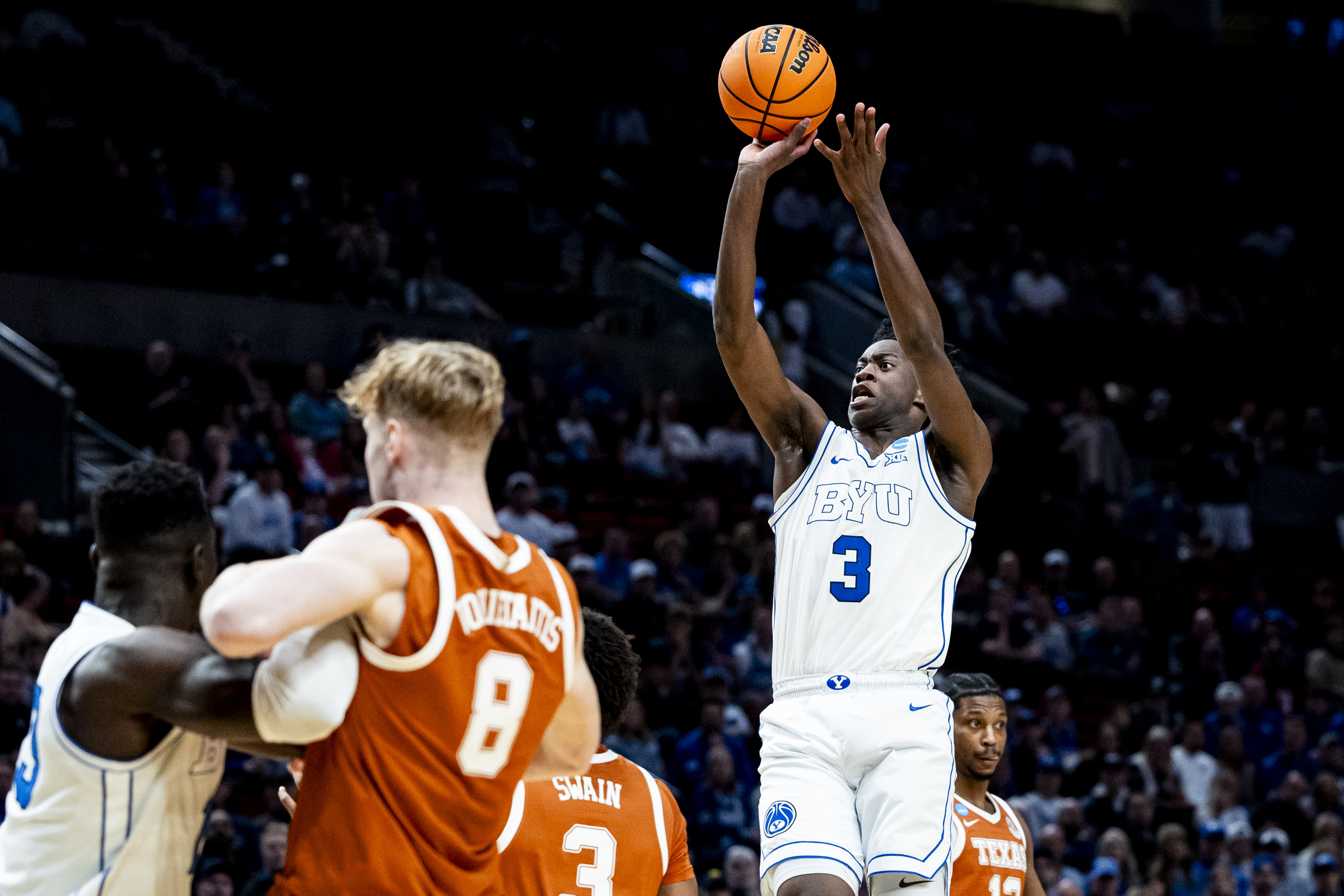 BYU forward AJ Dybantsa (3) takes a jump-shot during a first-round college basketball game against Texas in the NCAA Tournament held at the Moda Center in Portland, Ore., on Thursday, March 19, 2026.