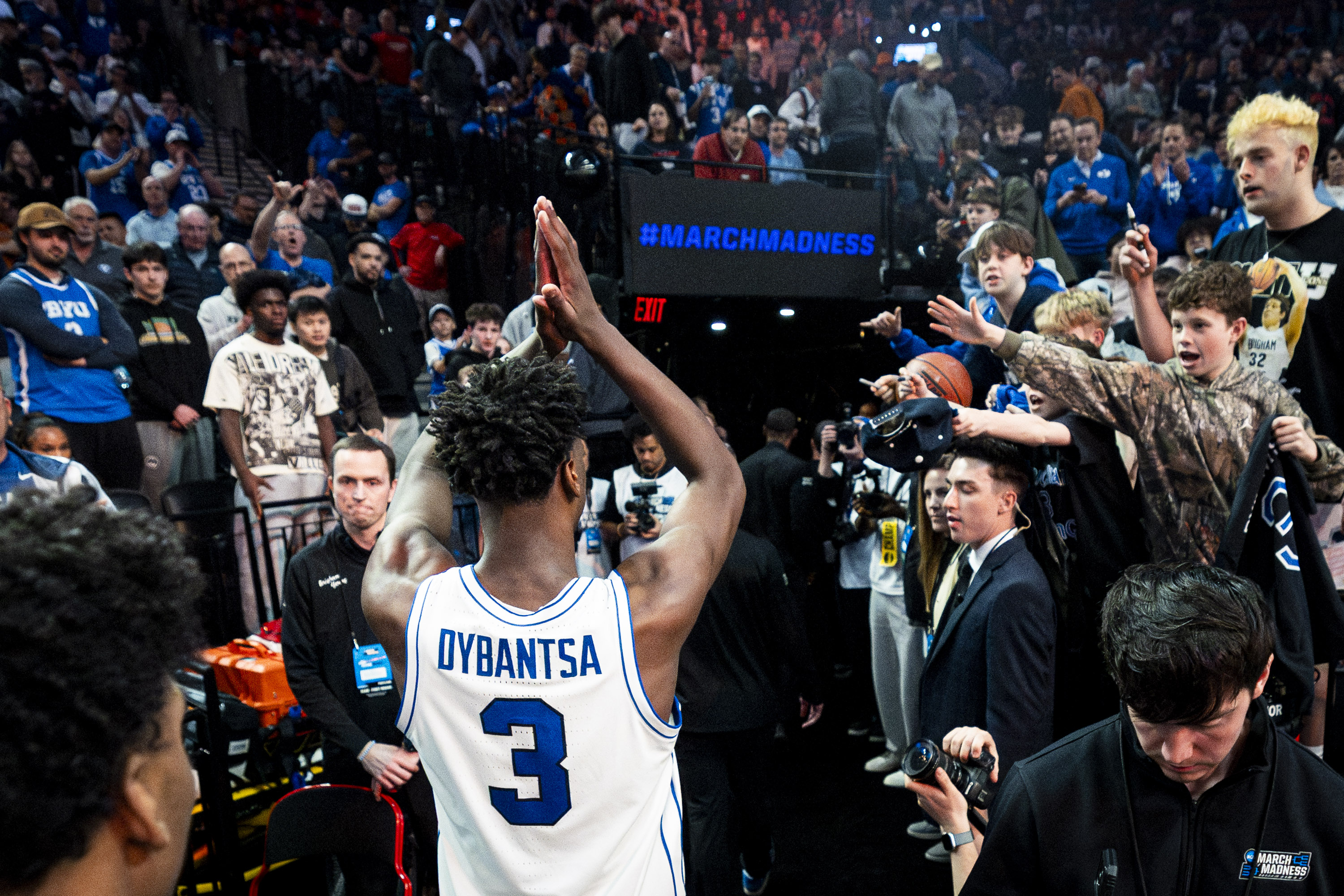 BYU forward AJ Dybantsa (3) gestures to the crowd after the Cougars were eliminated by Texas 79-71 in the first-round of the NCAA Tournament held at the Moda Center in Portland, Ore., on Thursday, March 19, 2026.
