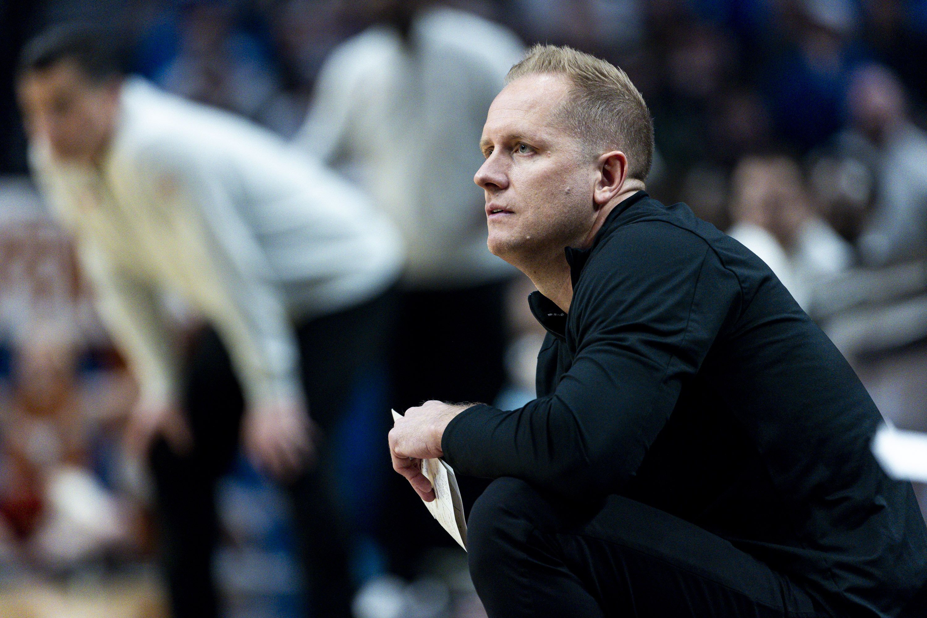 BYU head coach Kevin Young looks to the floor as a play unfolds against Texas during a first-round college basketball game in the NCAA Tournament held at the Moda Center in Portland, Ore., on Thursday, March 19, 2026.