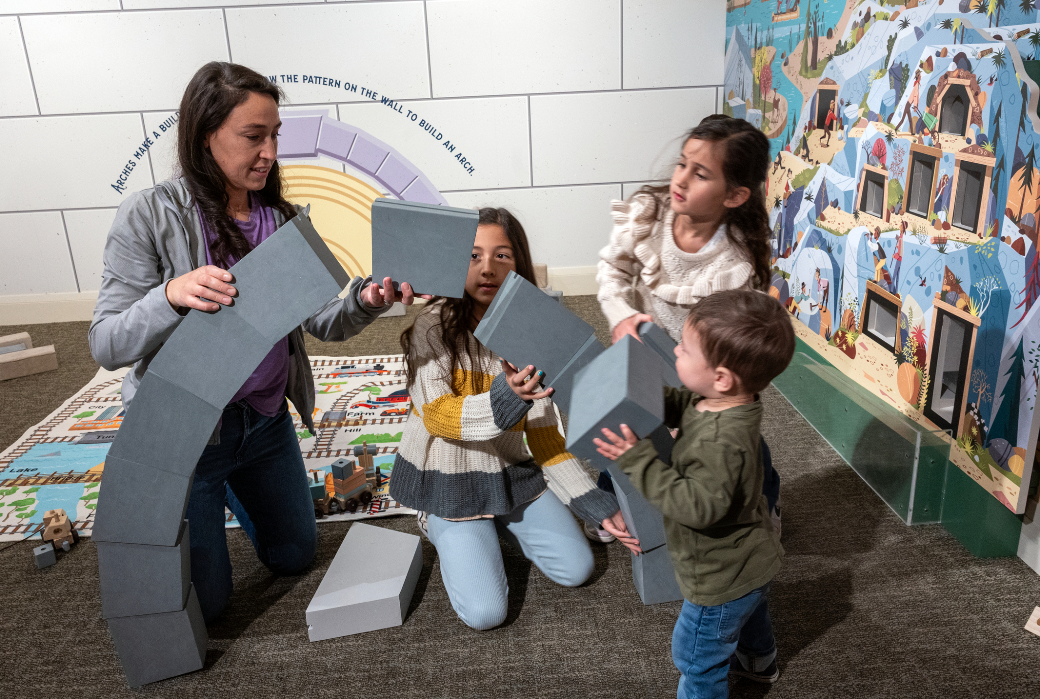 Children enjoy "A Firm Foundation" a new exhibit at the Church History Museum, on March 14.