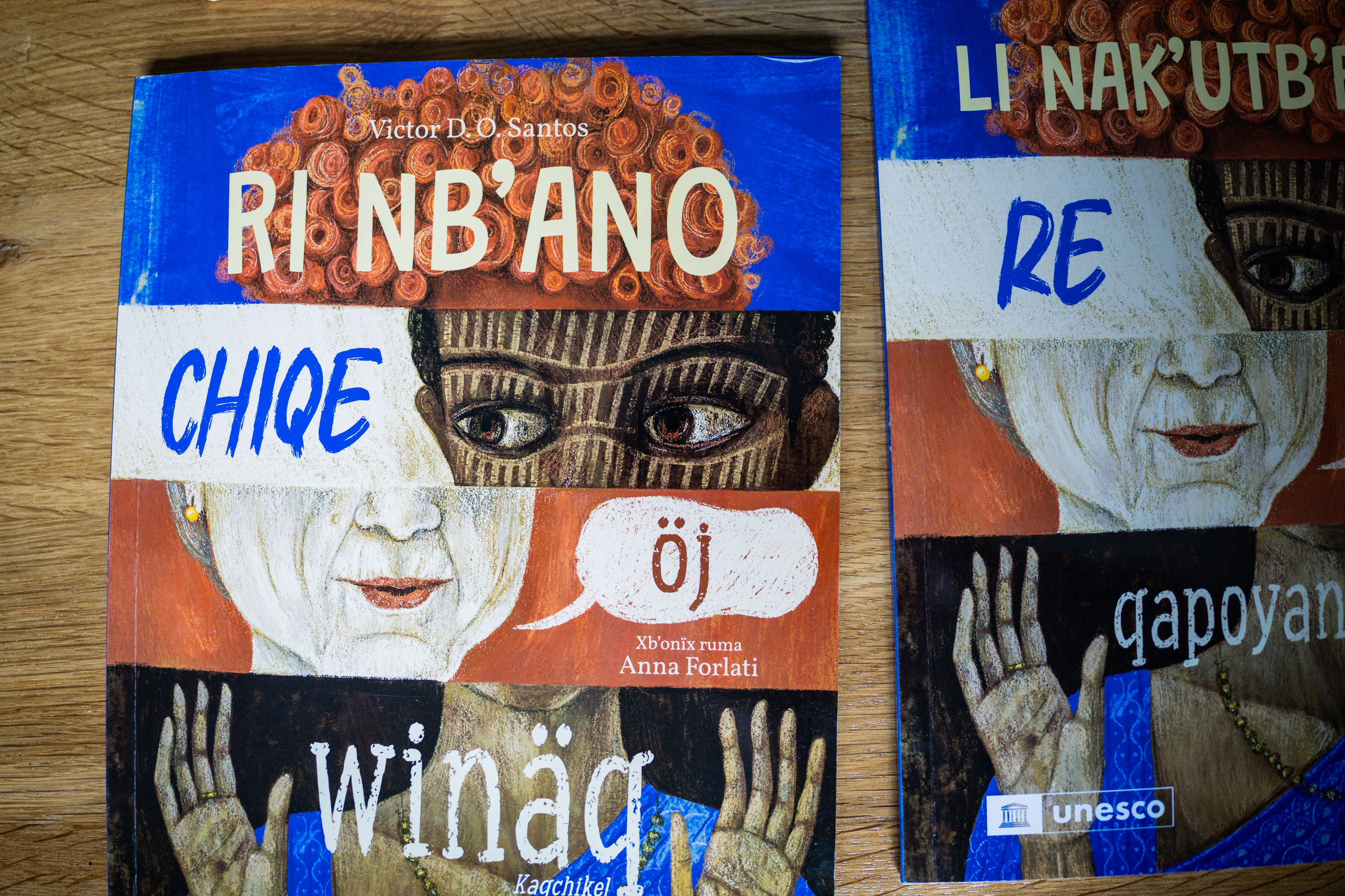 A book written in the Kaqchikel language, left, lies on a table at the home of Winston Scott, director of Mayan Languages Preservation, a foundation dedicated to teaching and preserving the Mayan language, in Salt Lake City on Feb. 25. Discovering the Mayan language led to Scott changing his major at the University of Utah.