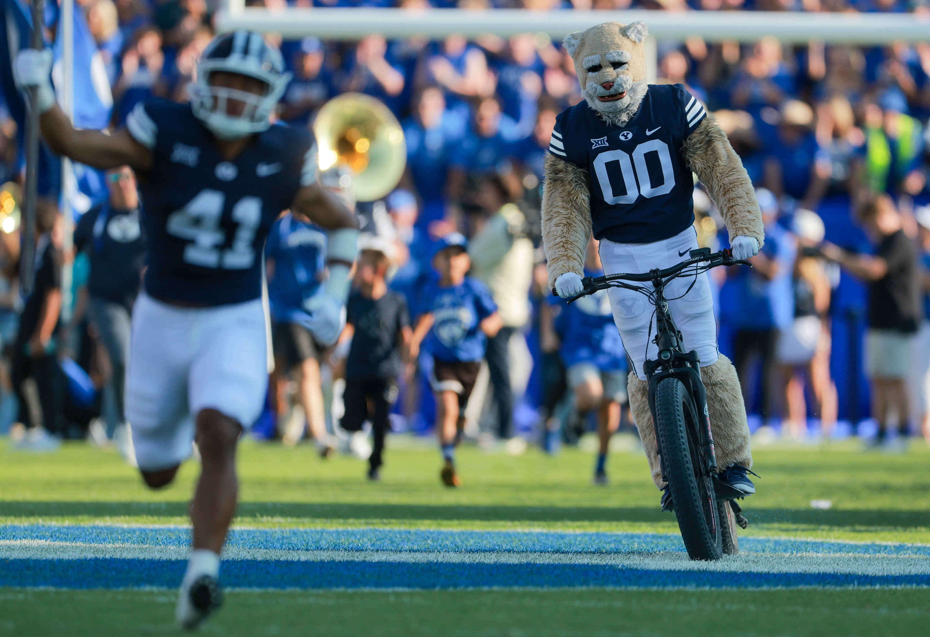 Cosmo the Cougar to join local elementary school kids in bike bus parade