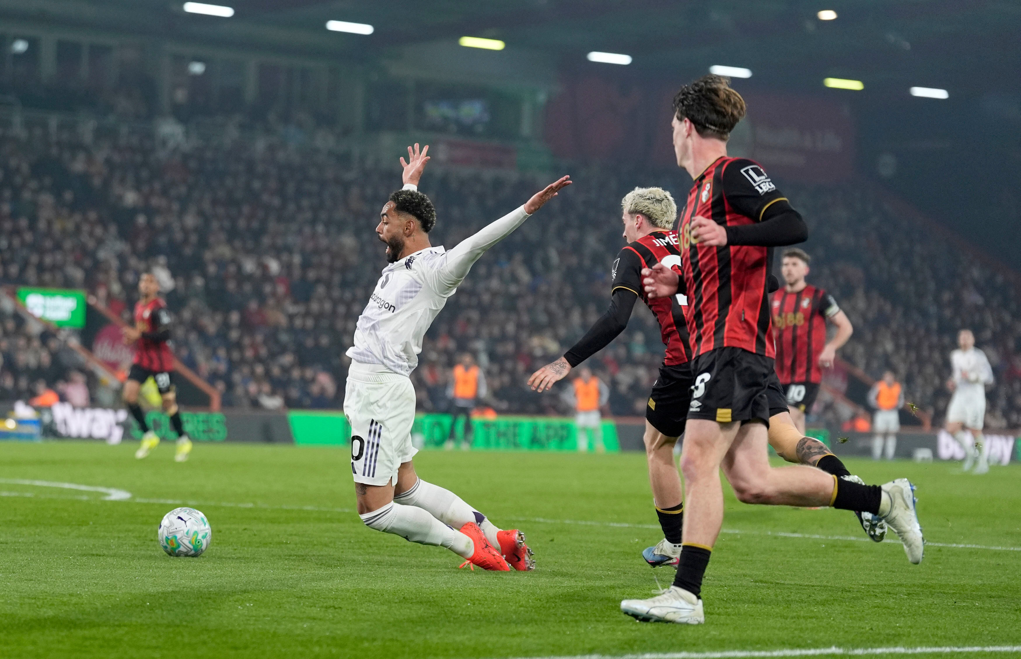 Manchester United's Matheus Cunha is fouled in the box by Bournemouth's Alex Jimenez during an Premier League soccer match against AFC Bournemouth, Friday, March 20, 2026, in Bournemouth, England. 