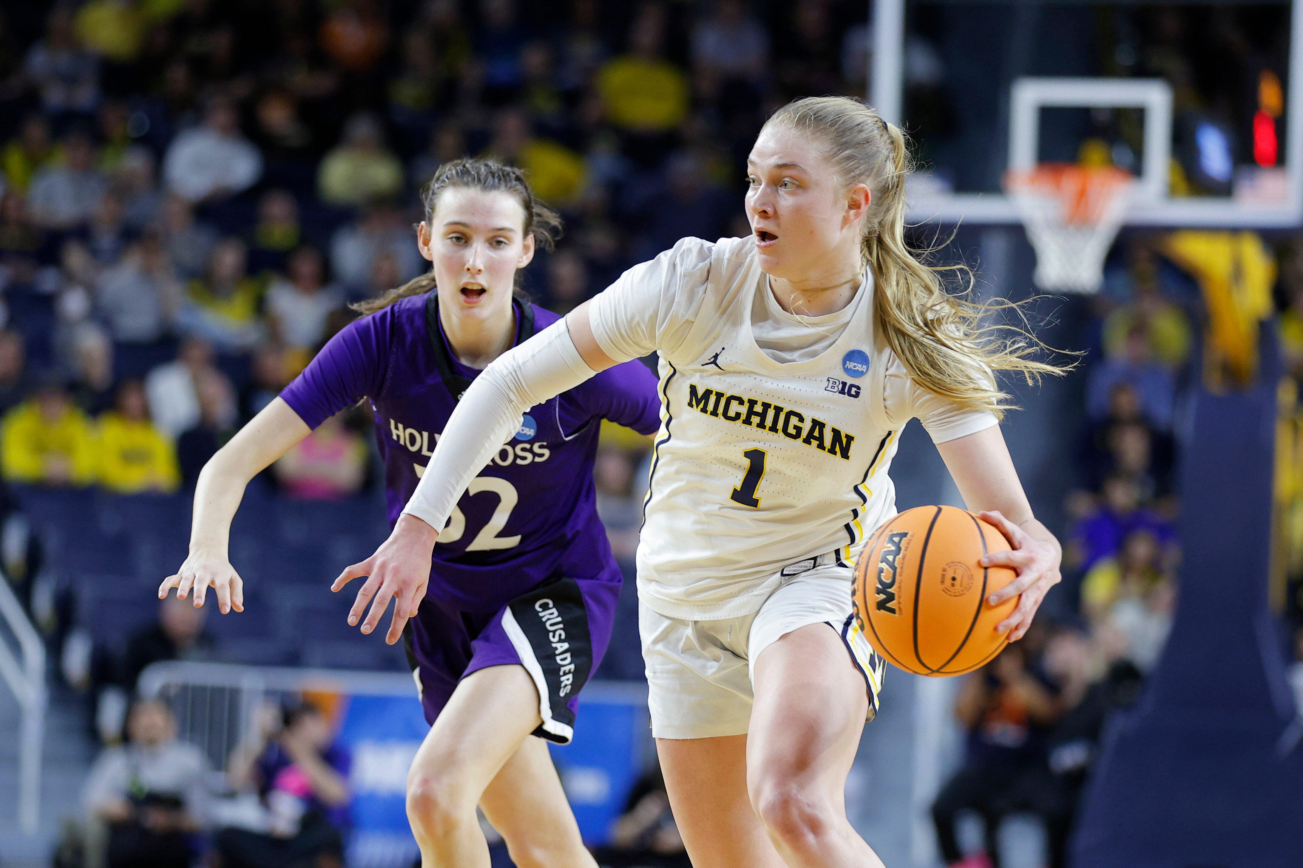 March Madness mismatch: No. 2 Michigan routs Holy Cross 83-48 in women's NCAA Tournament