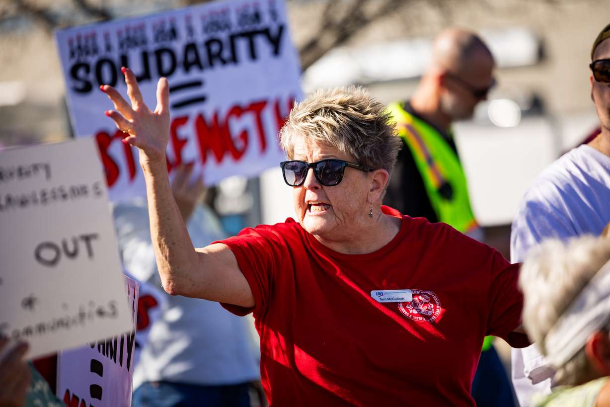 People protest to call attention to what they say are ICE's violations of the city conditional use permit to operate at an office in Ogden on Friday. City officials say they've identified no violations.
