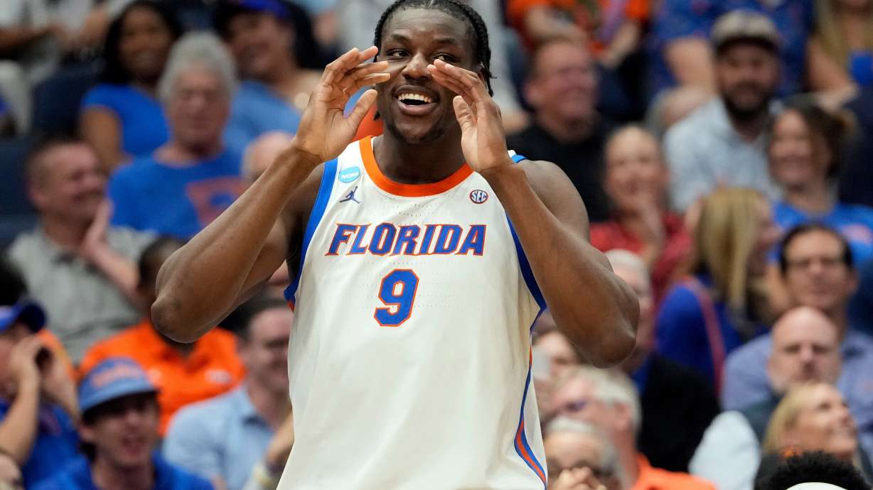 Florida center Rueben Chinyelu (9) celebrates during the second half in the first round of the NCAA college basketball tournament against Prairie View A M Friday, March 20, 2026, in Tampa, Fla.
