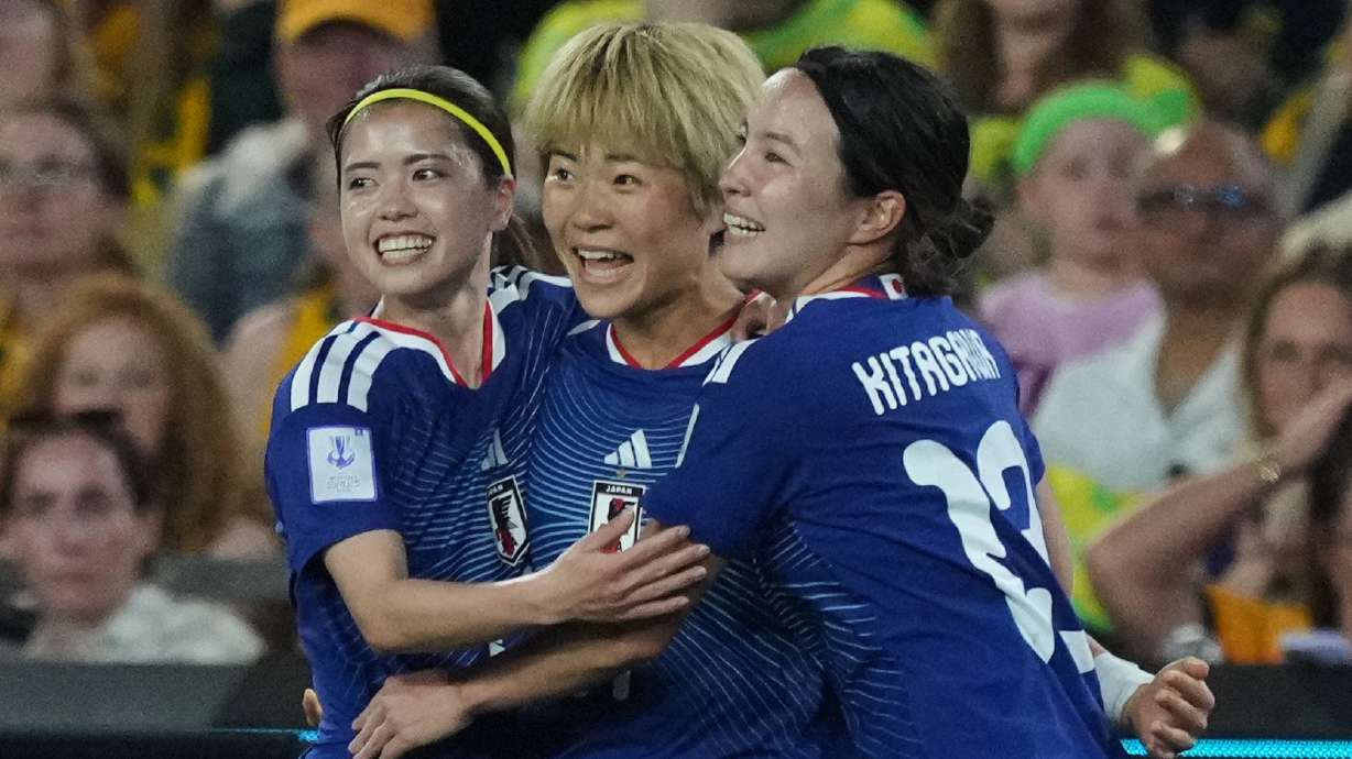 Japan's Maika Hamano, center, celebrates after scoring the first goal during the Women's Asian Cup soccer final between Japan and Australia in Sydney, Saturday, March 21, 2026.