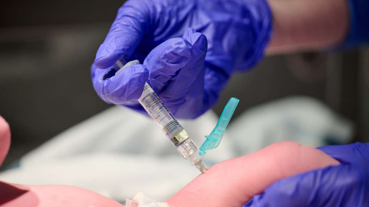 Nurse Robin Waldridge administers a vitamin K shot to a newborn baby at Norton Women's and Children's Hospital on March 6, at the hospital in Louisville, Ky. Doctors have noticed a trend of parents refusing newborn preventive care.