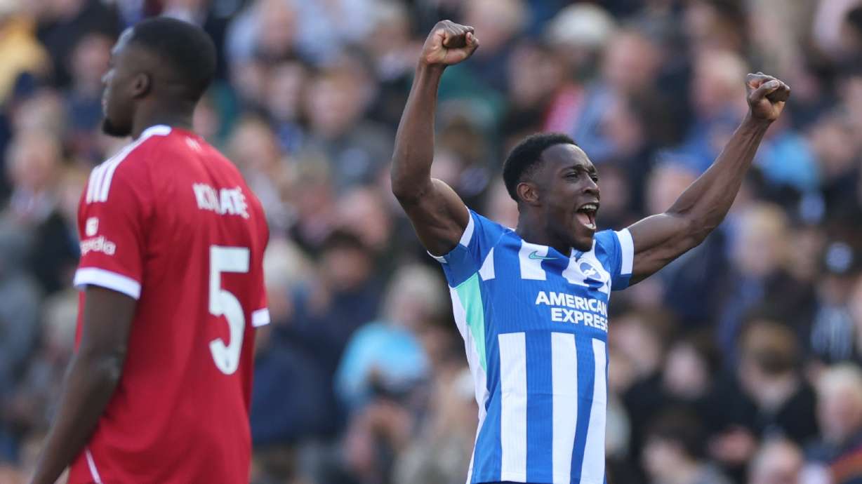 Brighton's Danny Welbeck celebrates after scoring during the English Premier League soccer match between Brighton and Liverpool in Brighton, Saturday, March 21, 2026.