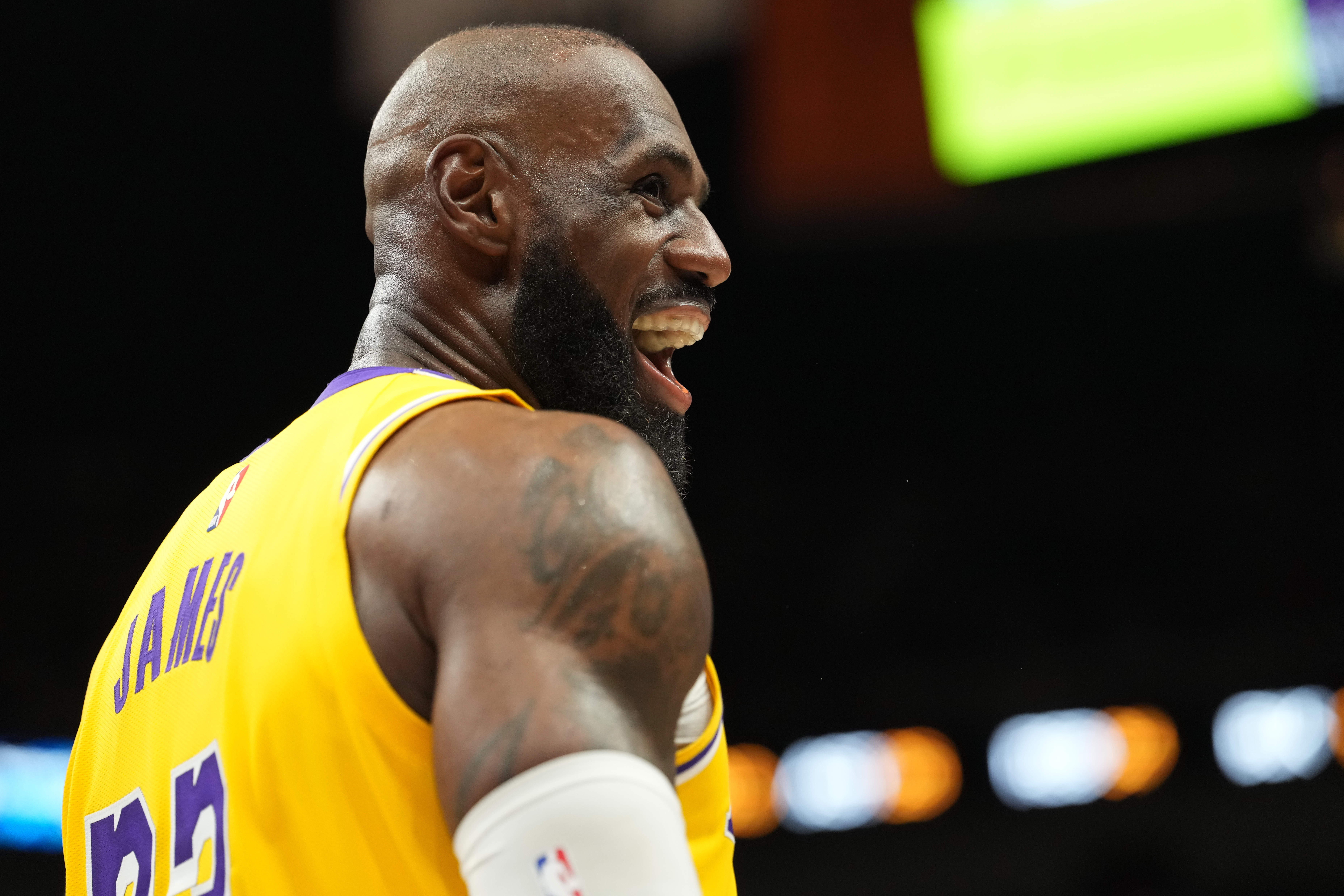 Los Angeles Lakers forward LeBron James smiles during the second half of an NBA basketball game against the Miami Heat, Thursday, March 19, 2026, in Miami. 