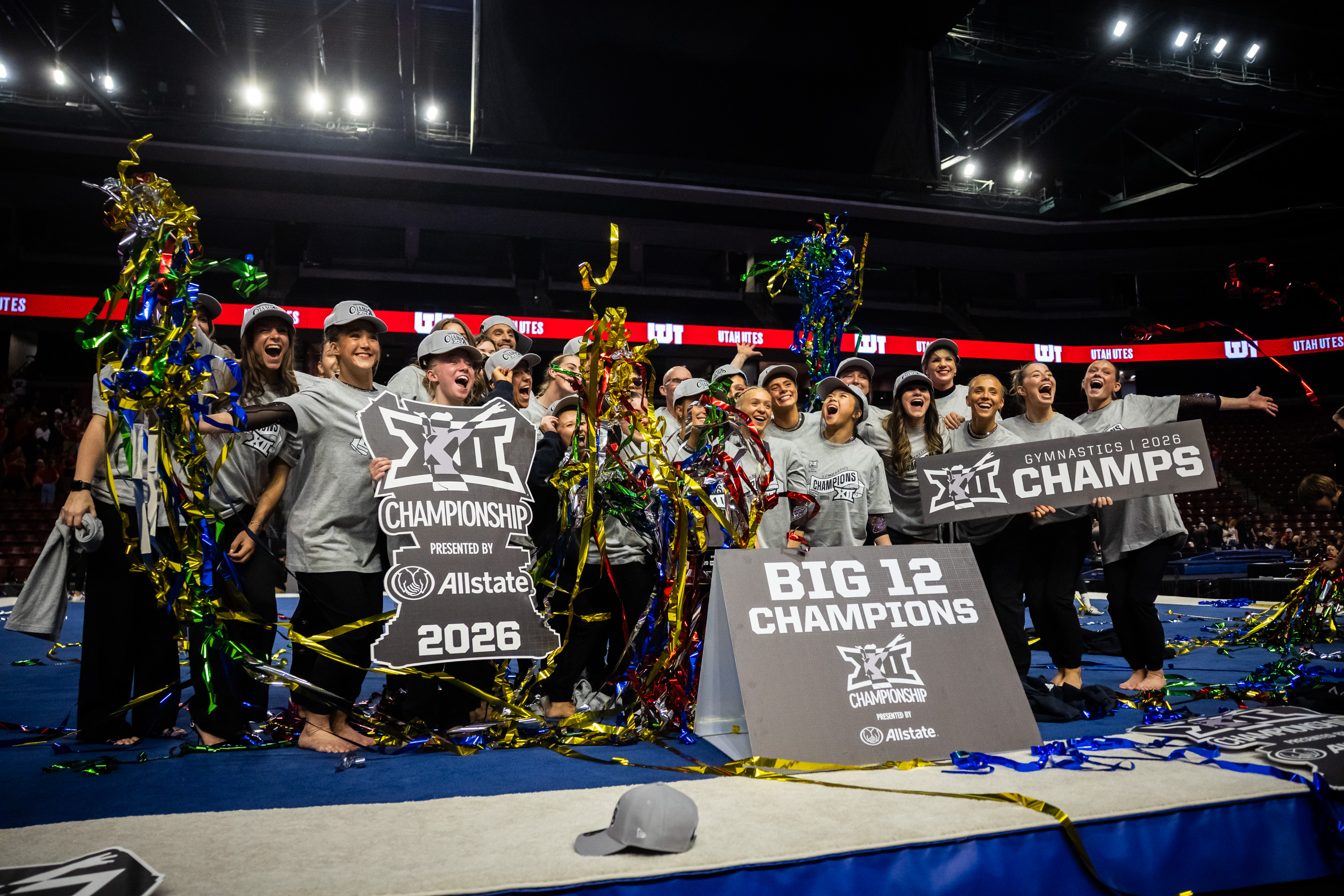 The Red Rocks celebrate after winning the Big 12 gymnastics championships at the Maverik Center in West Valley City on Saturday, March 21, 2026.
