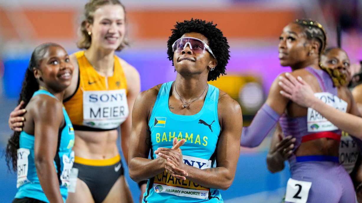 Devynne Charlton, of Bahamas, reacts after crossing the finish line to win the gold medal in the women's 60 meters hurdles final at the World Athletics Indoor Championships in Torun, Poland, Sunday, March 22, 2026.