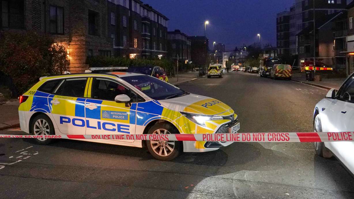 Police blocks a road in London, Monday after an apparent arson attack on four vehicles belonging to a Jewish ambulance service, Hatzola Northwest, in London.