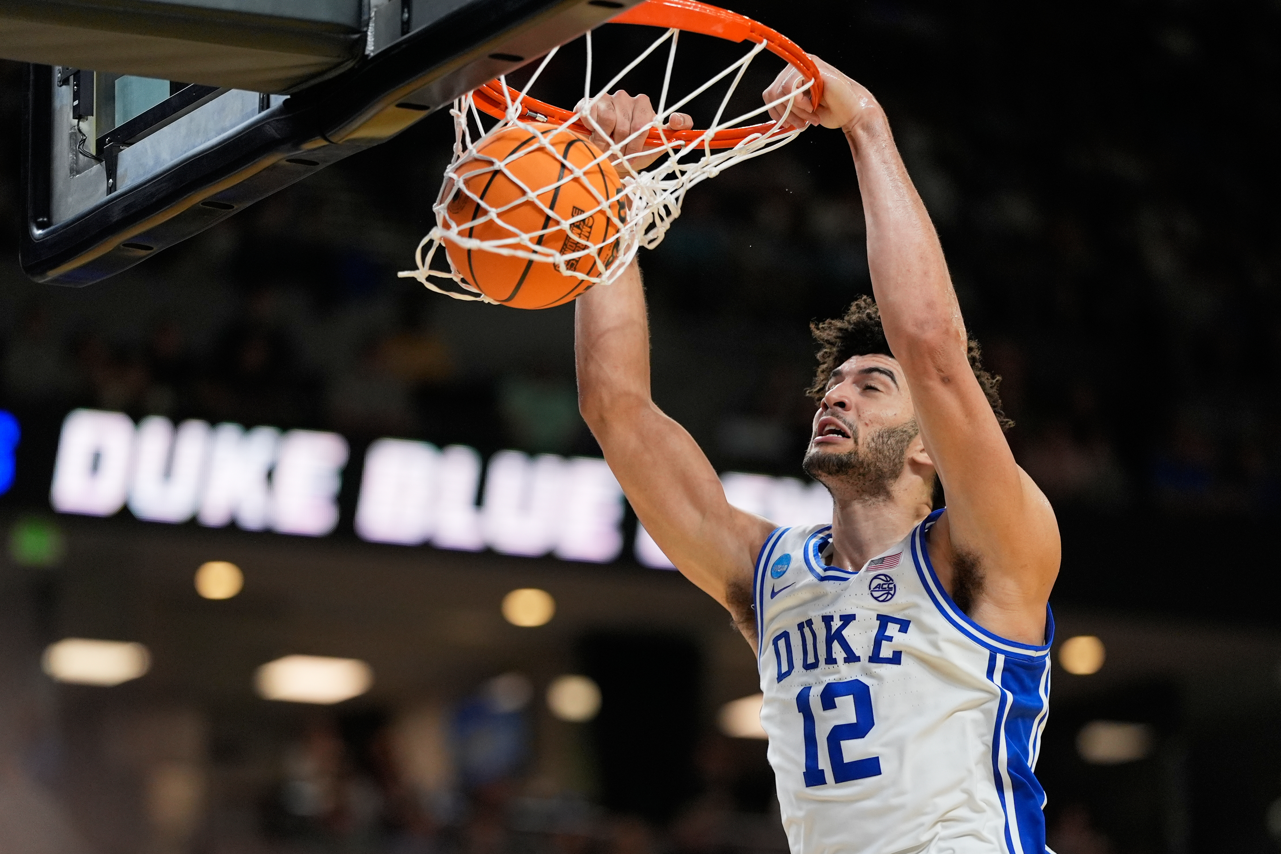 Duke forward Cameron Boozer dunks against TCU during the second half in the second round of the NCAA college basketball tournament, Saturday, March 21, 2026, in Greenville, S.C. 