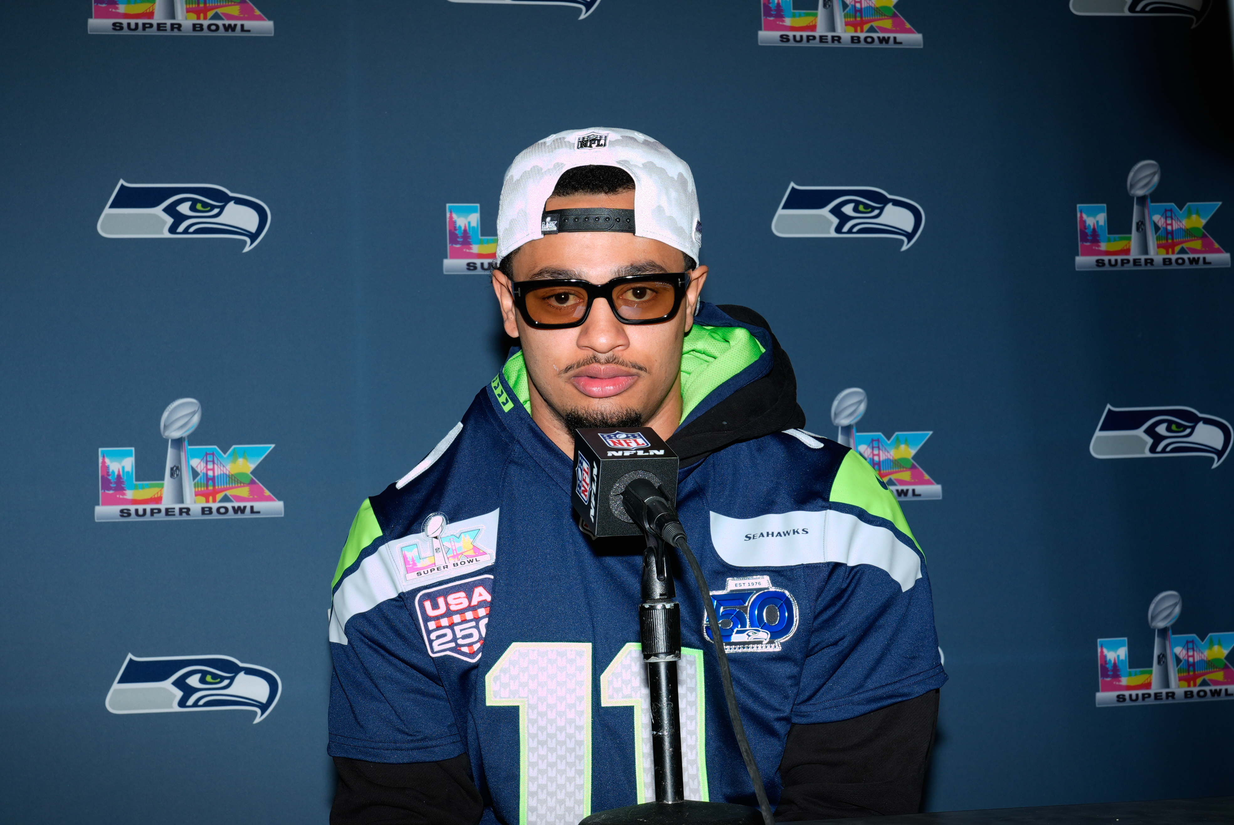 FILE - Seattle Seahawks wide receiver Jaxon Smith-Njigba speaks during a news conference on Feb. 4, 2026, in San Jose, Calif., ahead of Super Bowl 60 between the New England Patriots and the Seattle Seahawks.